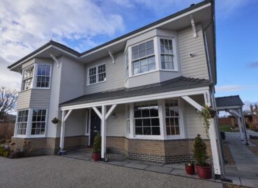 front view of timber windows, doors and porch.