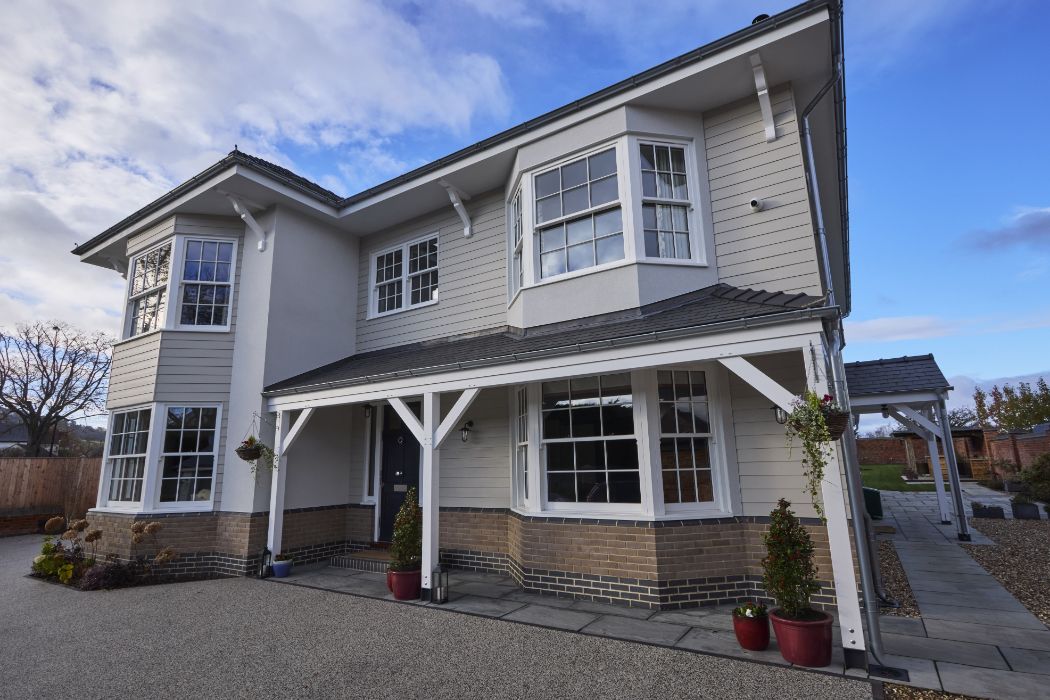 front view of timber windows, doors and porch.