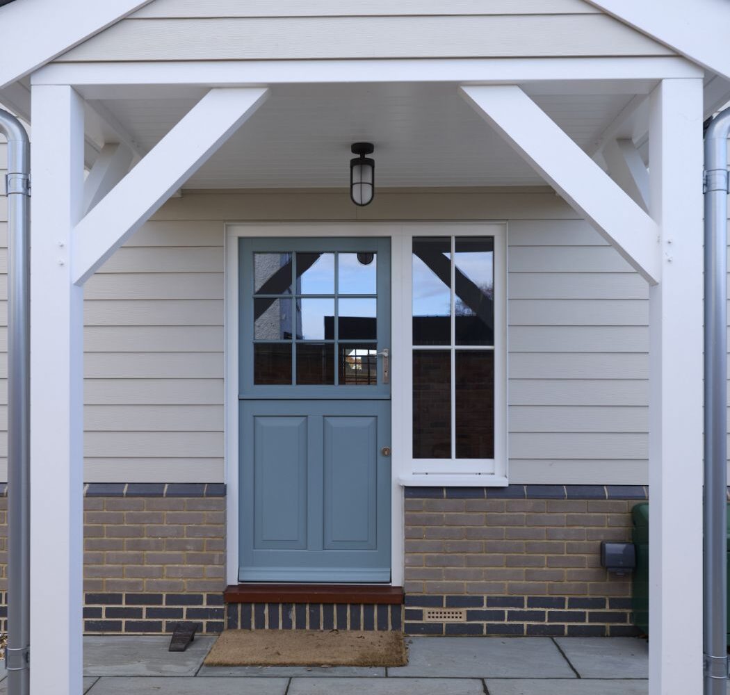 front entrance with New England style porch.