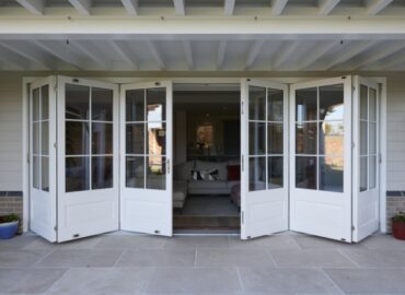 slightly open bi folding timber doors