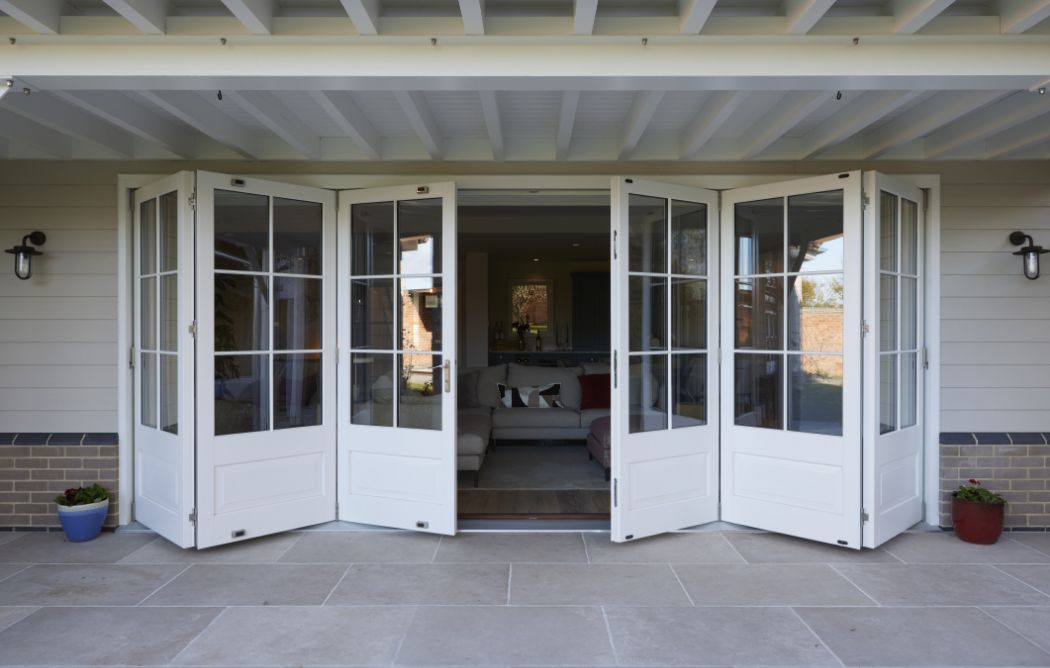 slightly open bi folding timber doors