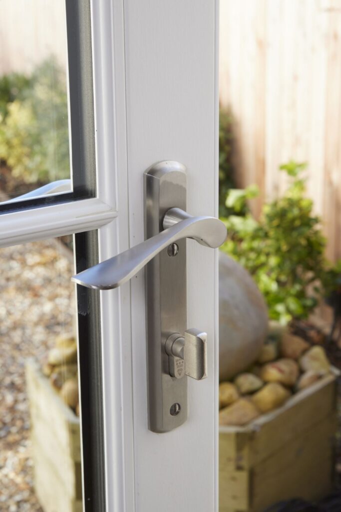 lever handle with thumb lock on door.