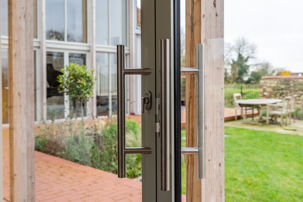 sliding door handles looking into garden.