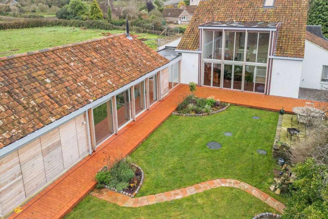 high view of garden showcasing aluminium windows and doors by QBD.